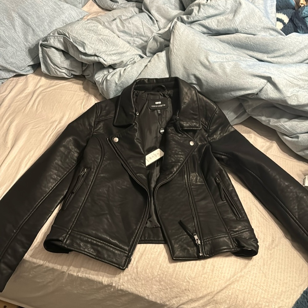 BRAND NEW! Size large black moto jacket.